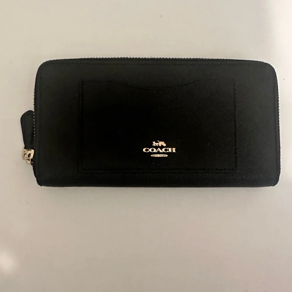 Coach accordion zip